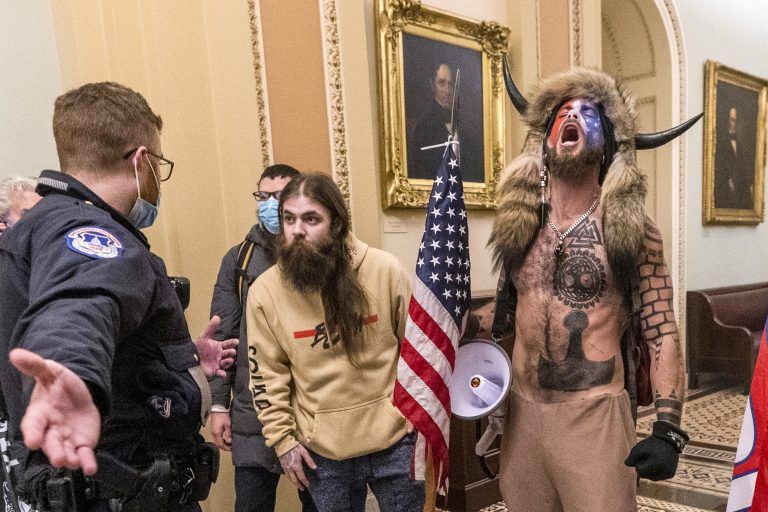 ‘QAnon Shaman’ from Jan. 6 Sues Trump for $40 TRILLION