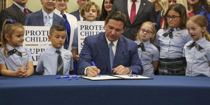 Florida Gov. Ron DeSantis signs the Parental Rights in Education bill.