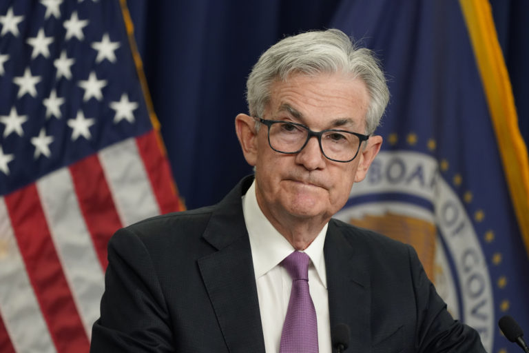 Powell Warns of Economic Risks as Fed Keeps Rates Steady