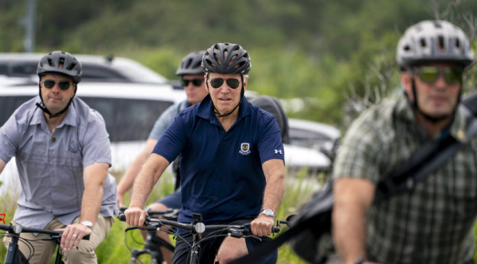 Joe Biden Cycling (photo by the AP)