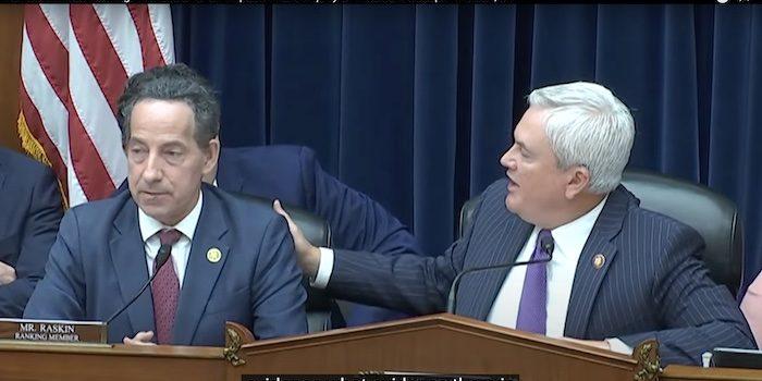 House Oversight Committee Chair James Comer gives his colleague Jamie Raskin a pat on the back to calm him down Thursday during the Biden impeachment proceedings.