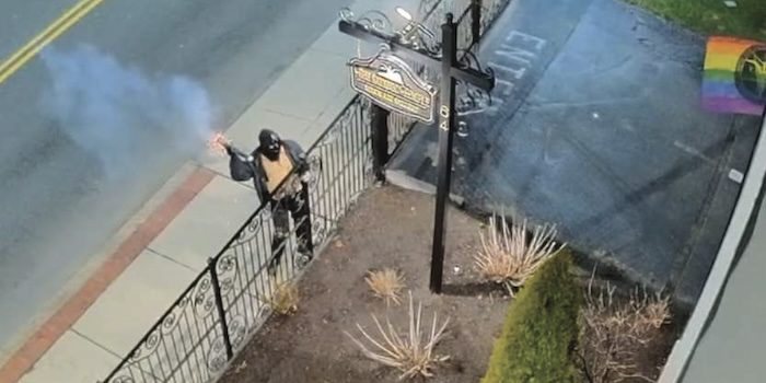 Surveillance footage of someone throwing a pipe bomb at The Satanic Temple. PHOTO: DOJ