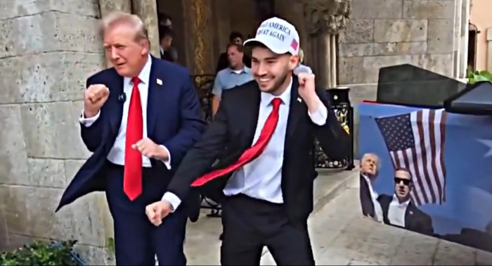 Donald Trump and Adin Ross dance next to a MAGA-wrapped Tesla Cybertruck. / SCREENSHOT: @AdinRoss via Kick