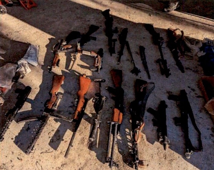 A cache of AK-47s allegedly found at the home of a 72-year-old North Carolina man. PHOTO: FBI