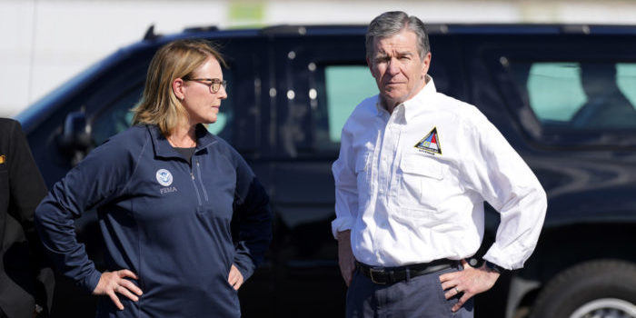 North Carolina Gov. Roy Cooper, right, and Deanne Criswell, Administrator of the U.S. Federal Emergency Management Agency