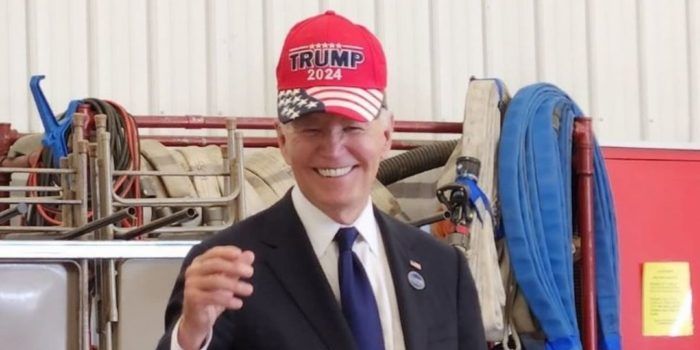 Joe Biden wears a 'Trump' hat