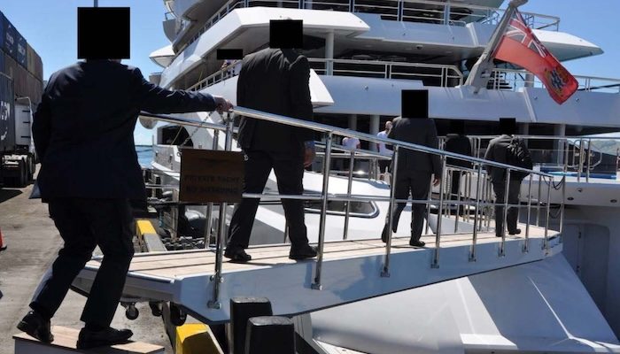 FBI agents, who faces were redacted by the DOJ, steal a Russian's boat in May 2022. PHOTO: DOJ