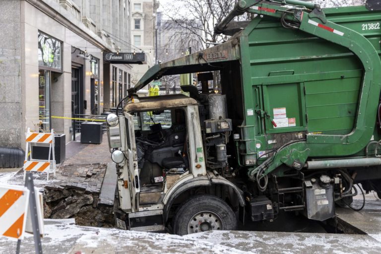 Downtown Omaha Loses Power for Hours after Garbage Truck Gets Stuck in Sinkhole