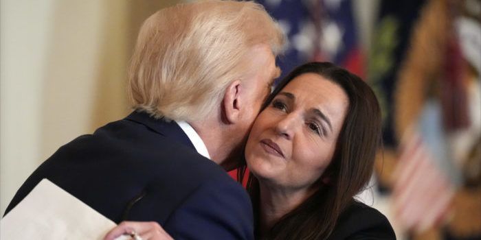 Donald Trump hugs Allyson Phillips