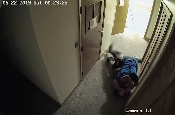 A June 2019 deadly fight at a Michigan recovery house. PHOTO: Screenshot from security footage