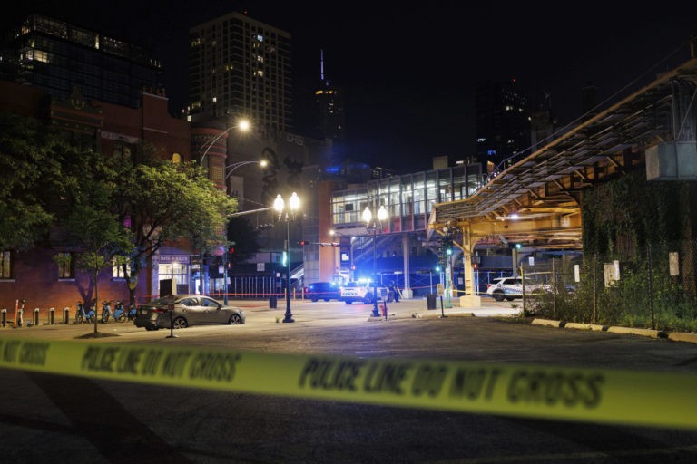 SUV Gunman Hits 12 People in Drive-By Chicago Shooting
